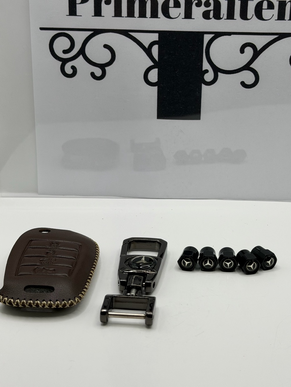 Brown Leather Key Cover and Black Metal Key Clip with Branded Valve Caps